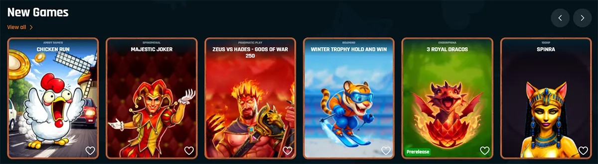 “New Games carousel on a dark casino site showing six slot tiles: Chicken Run, Majestic Joker, Zeus vs Hades – Gods of War 250, Winter Trophy Hold and Win, 3 Royal Dracos (prerelease), and Spinra, with heart favourites and left/right navigation arrows.”