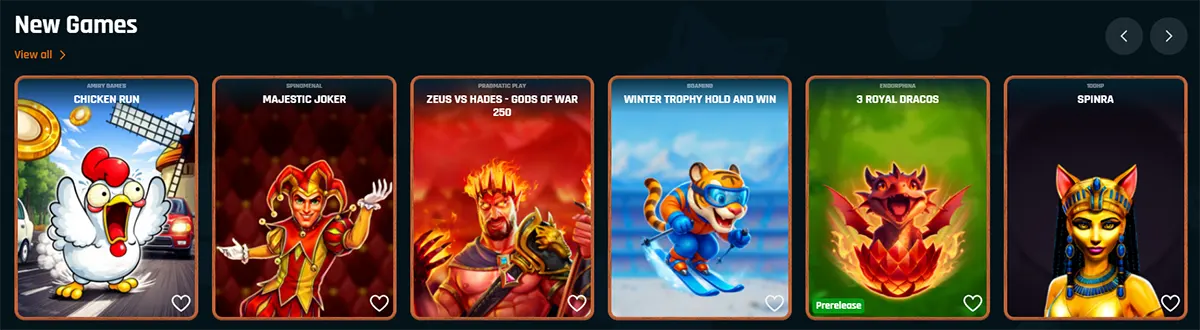 “New Games carousel on a dark casino site showing six slot tiles: Chicken Run, Majestic Joker, Zeus vs Hades – Gods of War 250, Winter Trophy Hold and Win, 3 Royal Dracos (prerelease), and Spinra, with heart favourites and left/right navigation arrows.”
